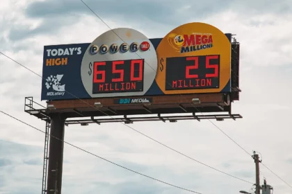 Roadside billboard in Missouri displaying Powerball and Mega Millions jackpot amounts