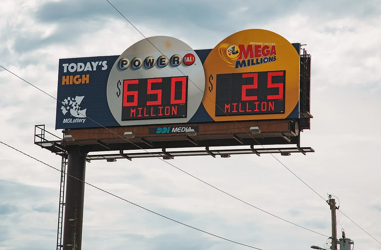 Roadside billboard in Missouri displaying Powerball and Mega Millions jackpot amounts