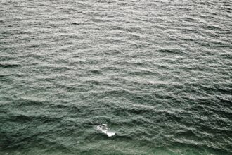 Ocean waves photographed from a drone, the restless surface of the Atlantic system